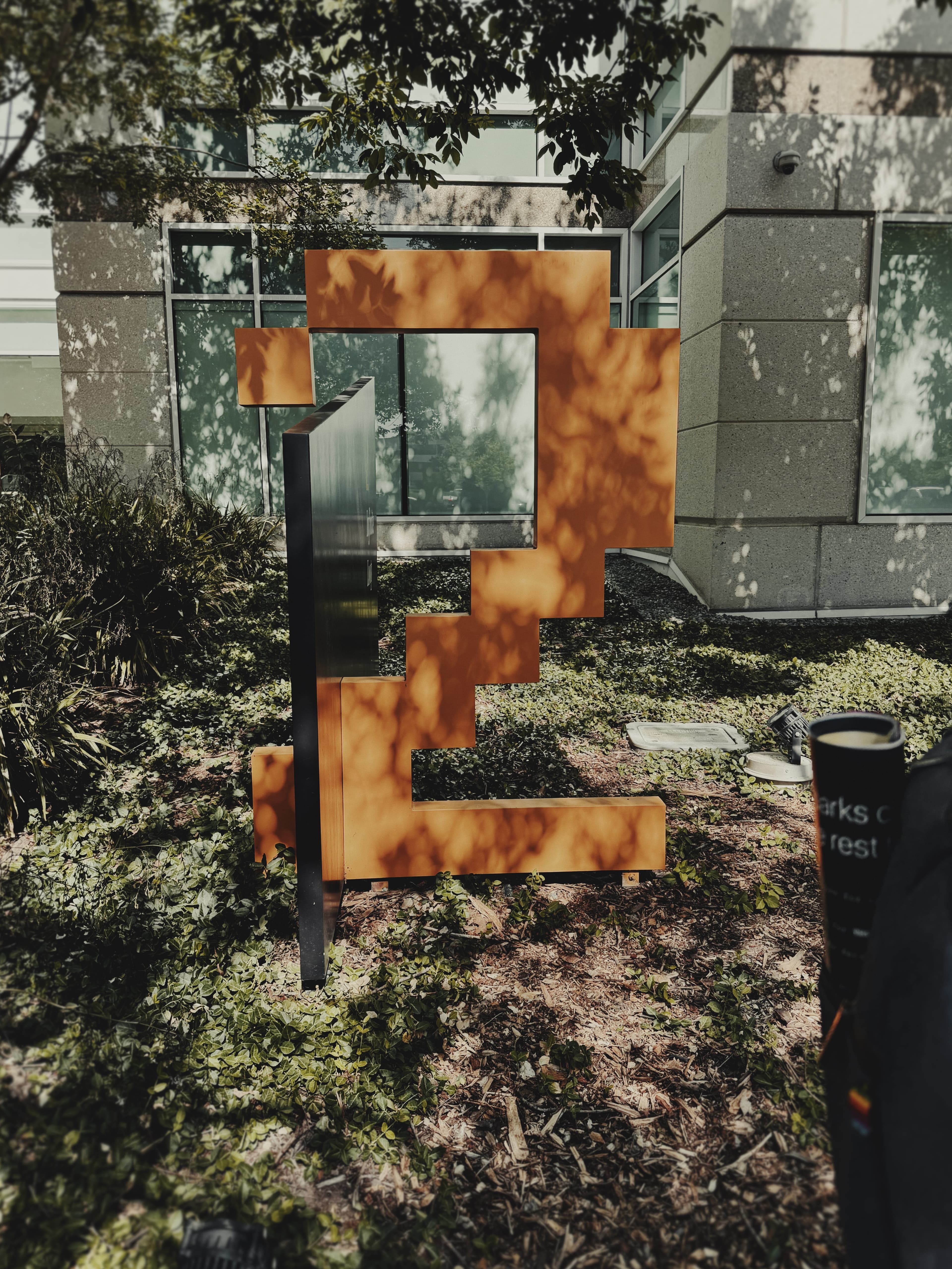 A photograph of the 2 Infinite Loop sign at Apple Campus.